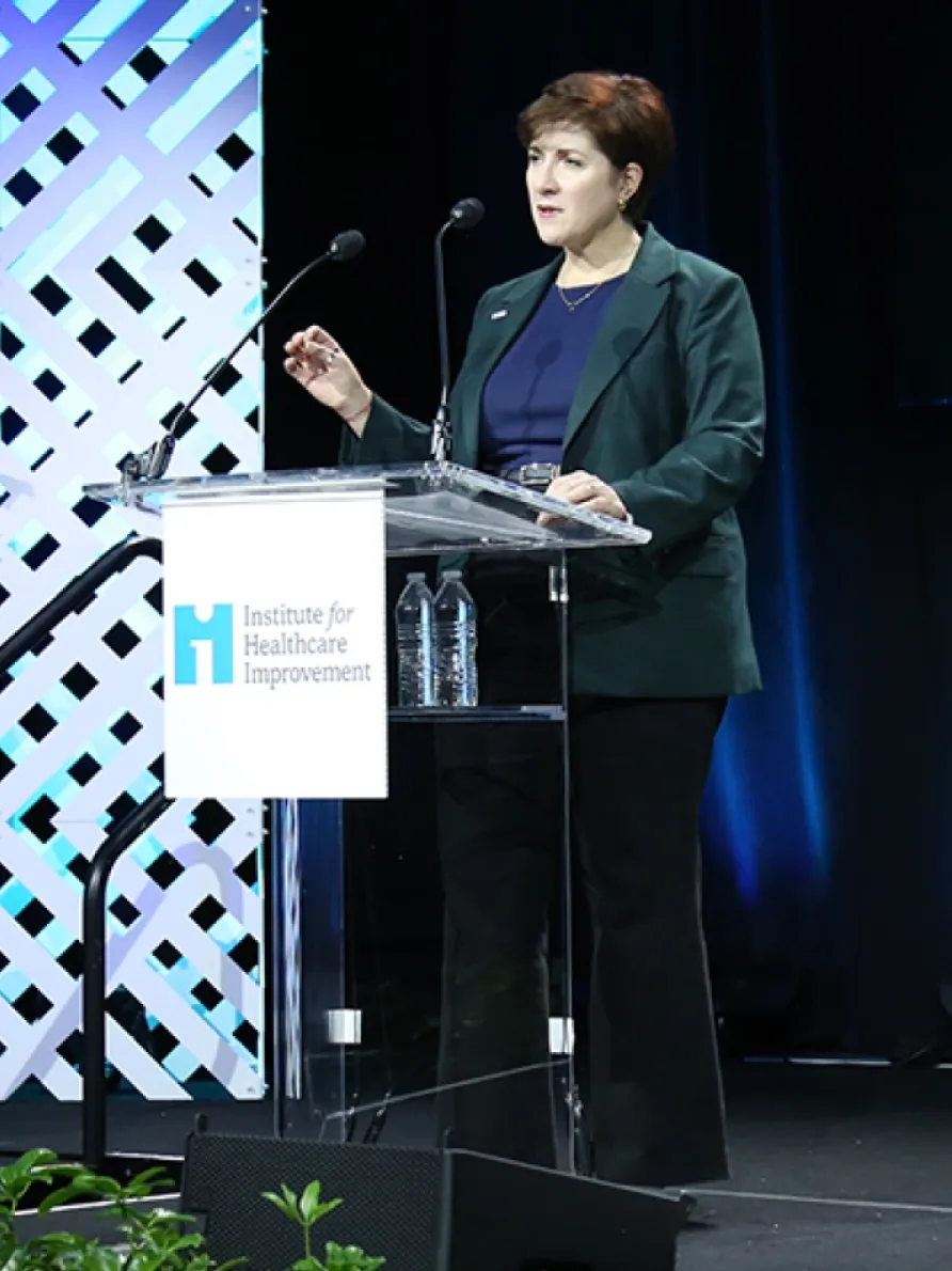 IHI Leadership Team speaking at podium