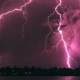 Purple sky filled with lightning